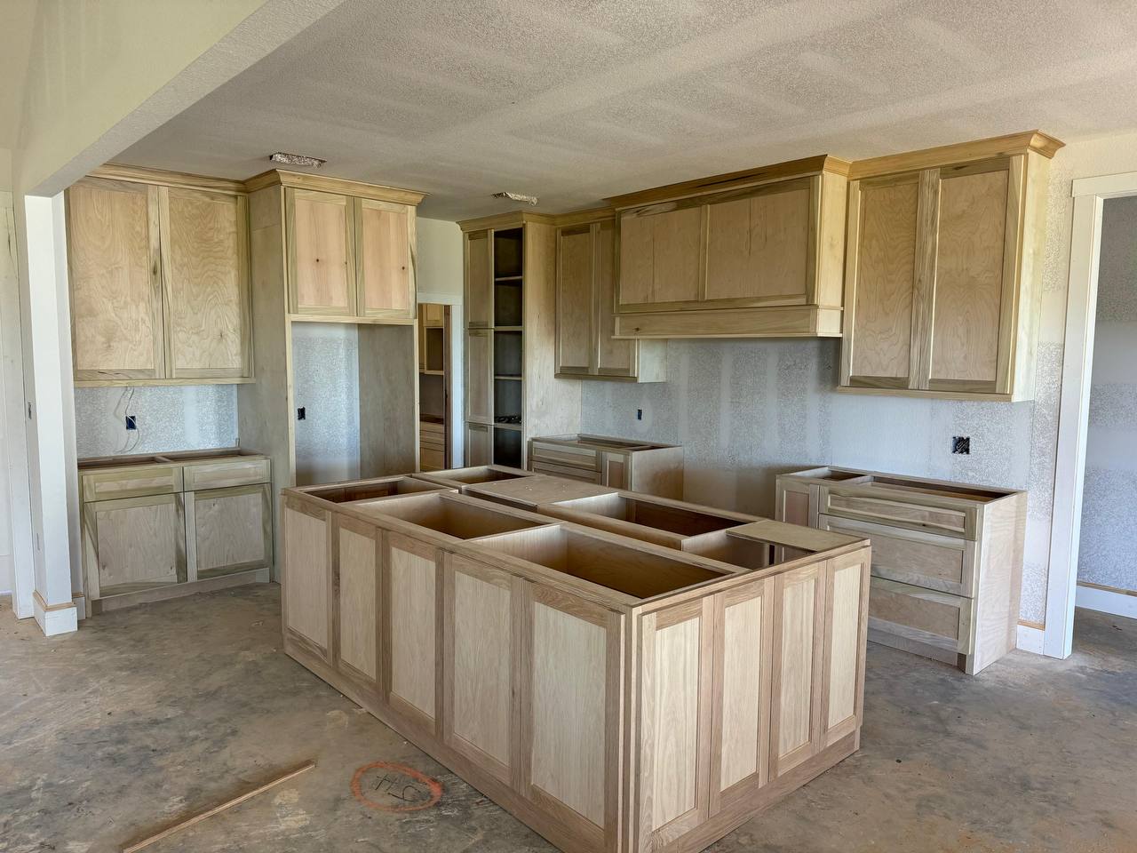 Kitchen during cabinet and island installation